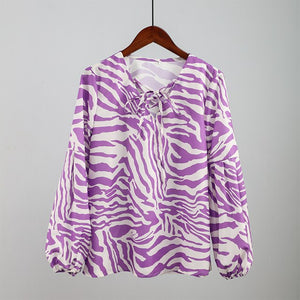Affluent Zebra V-neck Blouse