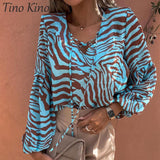 Affluent Zebra V-neck Blouse