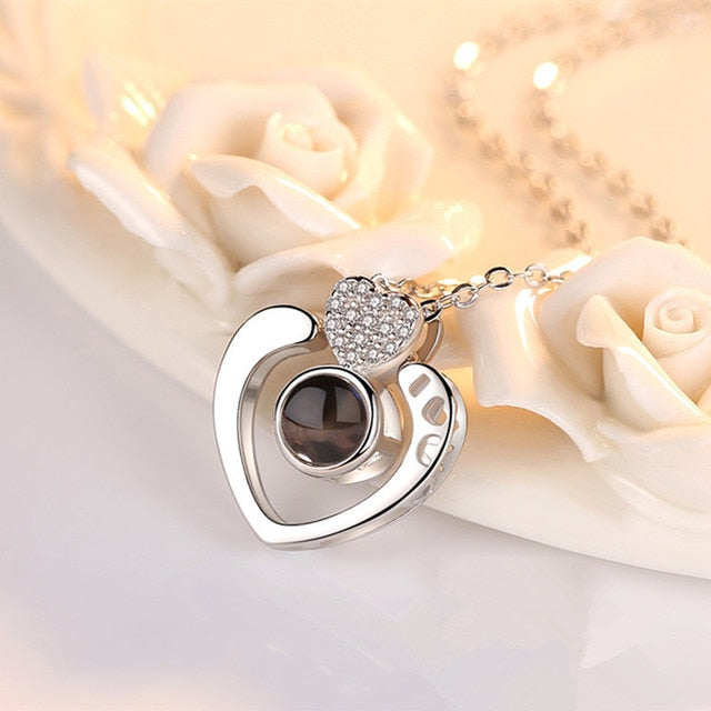 Say "I Love You" in 100 languages - Projection Necklace