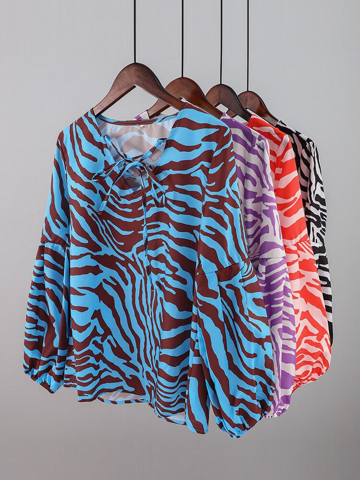 Affluent Zebra V-neck Blouse